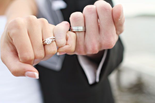 Couple Displaying Rings